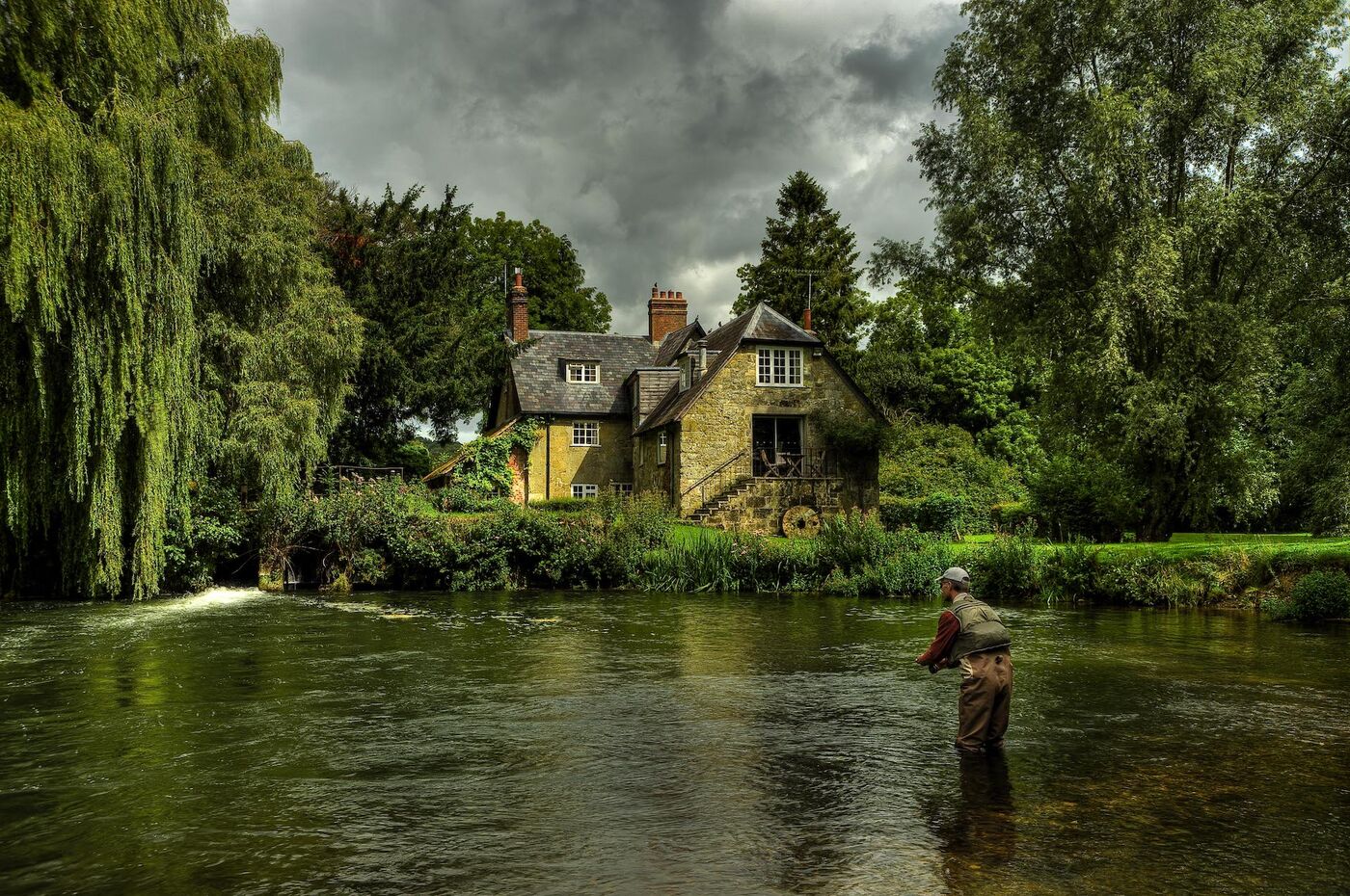 England's River Test chalk stream with angler